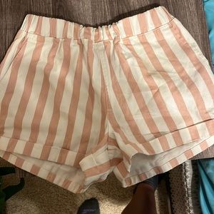 Forever 21 striped pink and blue shorts have pockets in the waist is stretchy